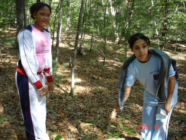 Touria and Jenny trying to find bugs