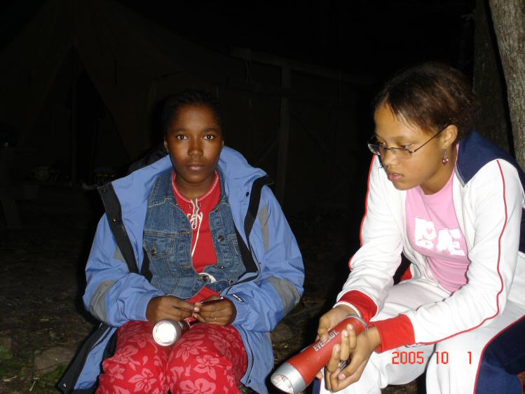 Lilian and Jenny around the fire